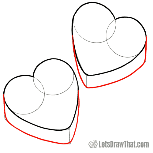 Drawing step: Outline the lower edges of the candy hearts