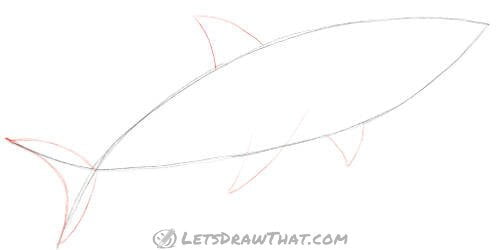 Drawing step: Add shark fins and tail